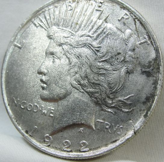 Very-Odd-Peace-Dollar.-Any-Help-Appreciated